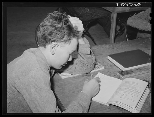 Schoolboy at the FSA (Farm Security Administration) farm workers' camp. Caldwell, Idaho
