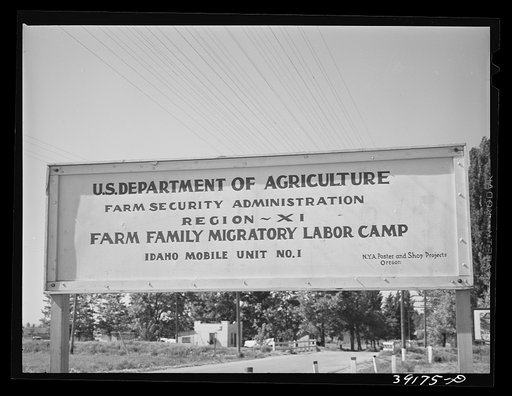 Sign. FSA ( Farm Security Administration) migratory labor camp mobile unit. Wilder, Idaho