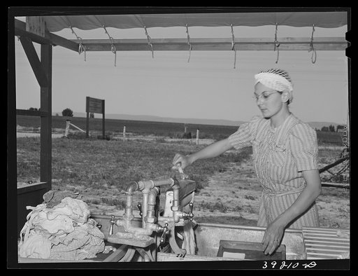 The nurse does her laundry at the FSA (Farm Security Administration) migratory labor camp mobile unit. Wilder, Idaho