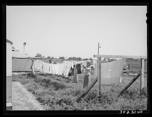 Laundry on the line. FSA (Farm Security Administration) migratory labor camp mobile unit. Wilder, Idaho