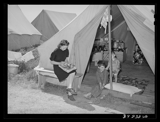 Family of farm worker living at FSA (Farm Security Administration) migratory labor camp mobile unit. Wilder, Idaho