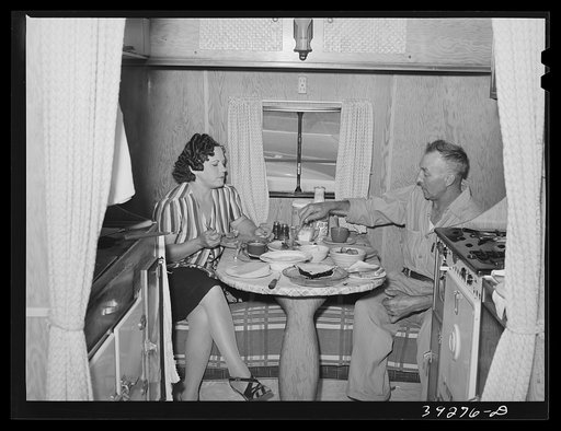 Construction worker of Kearney-Mesa and his wife have lunch in their trailer home. San Diego, California