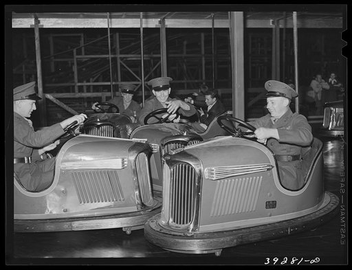Marines riding the electric automobile at Mission Beach amusement center. San Diego, California