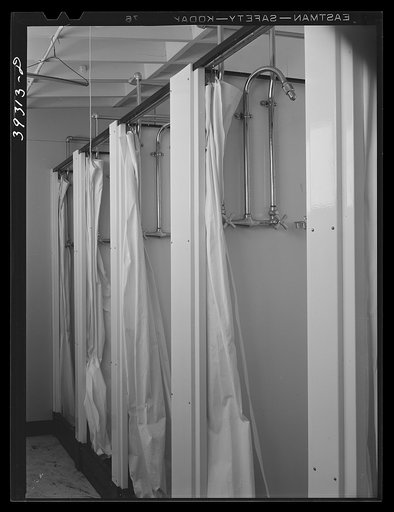 Showers at the FSA (Farm Security Administration) trailer camp for defense workers. San Diego, California