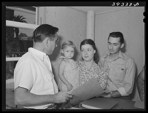 People requesting information and registering at the office of the FSA (Farm Security Administration) trailer camp for defense workers. San Diego, California