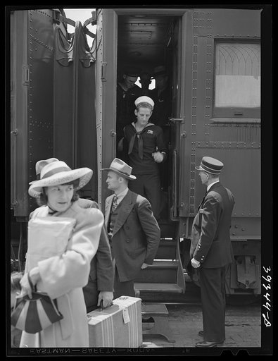 These four photographs were taken at the railroad station when a noon train came in. All trains coming into San Diego are crowded and are an indication of the hordes of people pouring into the city. California