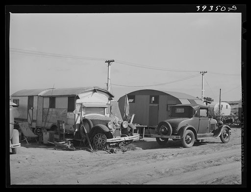 Trailer in trailer court. This trailer is obviously unmovable and because this court is assuming the characteristics of a shack town and because the sanitary facilities are inadequate, it will probably be condemned by board of health. San Diego, California