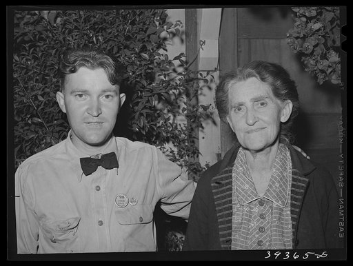 Consolidated Aircrafts workman and his mother who he supports. San Diego, California