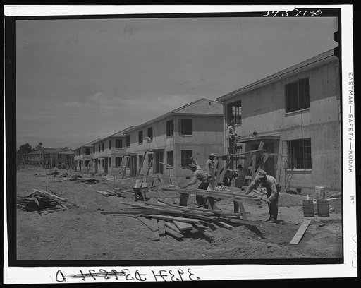 Houses under construction at the Navy defense housing project for enlisted men in the Marines and Navy. San Diego, California