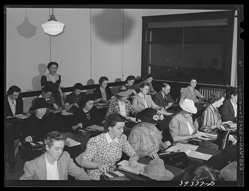 Untitled photo, possibly related to: Class in machine education at the San Diego Vocational School. There are forty to fifty machines constantly in operation in this class. San Diego, California