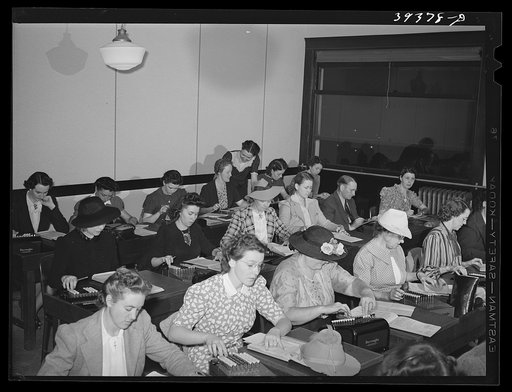 Class in machine education at the San Diego Vocational School. There are forty to fifty machines constantly in operation in this class. San Diego, California