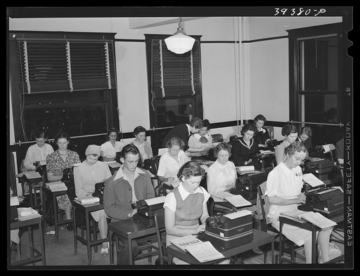 Untitled photo, possibly related to: Typing class at the San Diego Vocational School. During the day high school graduates attend this school. The night classes are attended by persons having jobs. San Diego, California