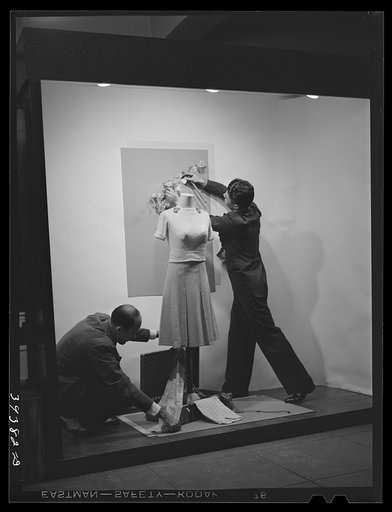 Untitled photo, possibly related to: Class in window display at the San Diego Vocational School. San Diego, California