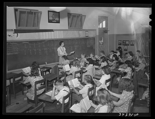 Untitled photo, possibly related to: Music class at the Balboa School, San Diego. The crowded condition of schoolrooms is obvious. California