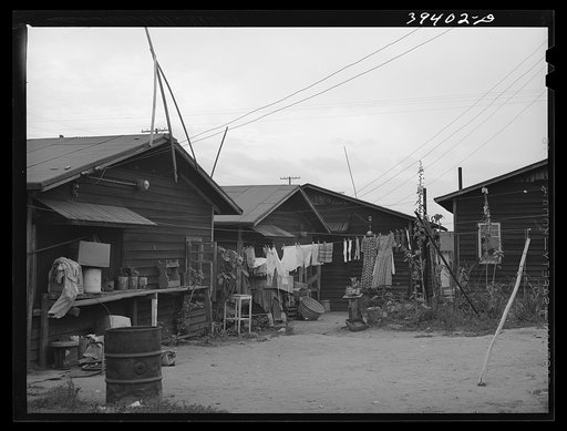 Backyards of houses rented to Mexicans. San Diego, California