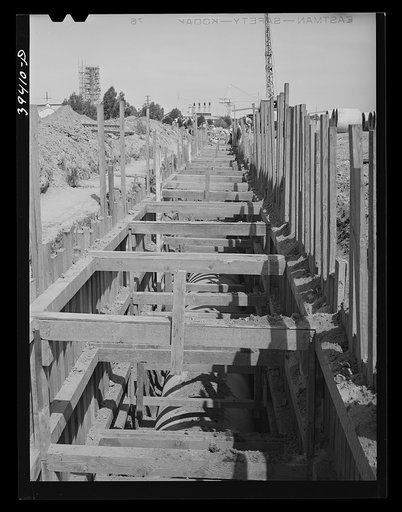 Untitled photo, possibly related to: Construction work of the sewage disposal plant and sewer lines leading to it. About ten miles of sewer pipe are being laid on this project. San Diego, California