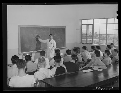 Instructor and class at the vocational school for aircraft construction workers. San Diego, California