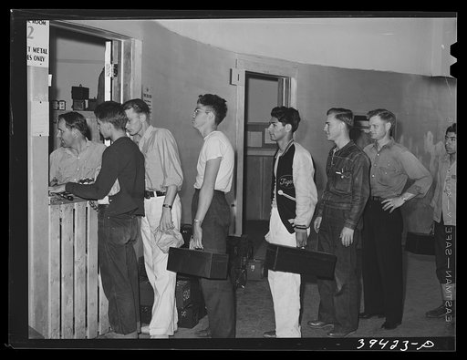 Checking in tools at the tool room at the vocational school for aircraft construction workers. San Diego, California