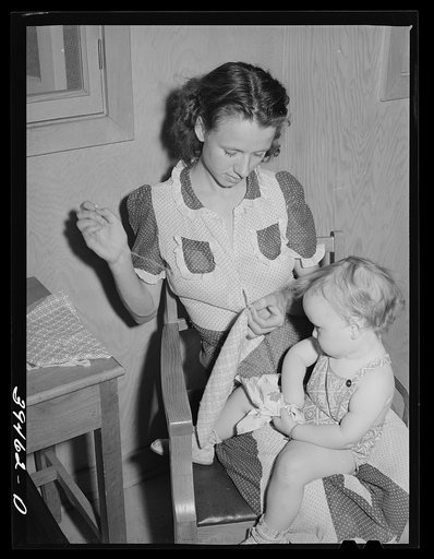 Mother and child. FSA (Farm Security Administration) farm labor camp. Caldwell, Idaho