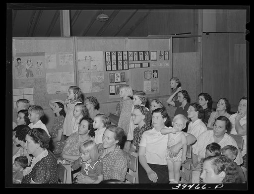 Mothers and children watching program by schoolchildren at end of term. FSA (Farm Security Administration) labor camp. Caldwell, Idaho