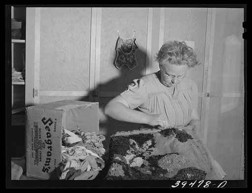 Farm worker's wife making hooked rug in sewing class. A WPA (Work Projects Administration) project at the FSA (Farm Security Administration) labor camp. Caldwell, Idaho