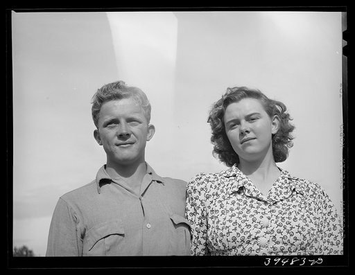 Untitled photo, possibly related to: This boy and girl were the champion pea pickers in the contractor's camp. They travel with their families in the contractor's camps. They have picked as many as thirty-two hampers each a day. Pay thirty cents per hamper. It is normal to pick about twenty hampers 