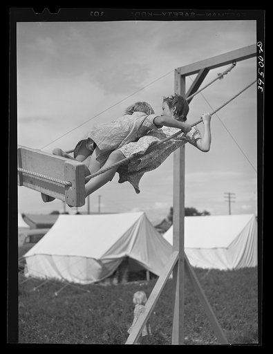 Untitled photo, possibly related to: Children playing in mobile unit of FSA (Farm Security Administration) labor camp. Nampa, Idaho