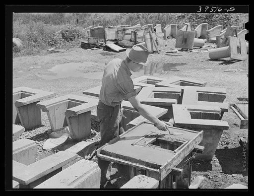 Making irrigation tile. Canyon County, Idaho. Practically all agriculture depends upon irrigation in this county