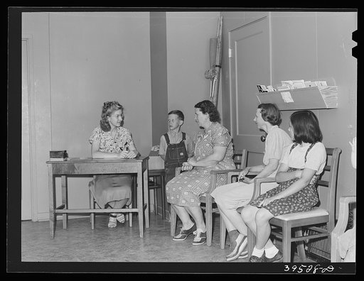 Waiting to see the doctor at the clinic of the FSA (Farm Security Administration) labor camp. Caldwell, Idaho