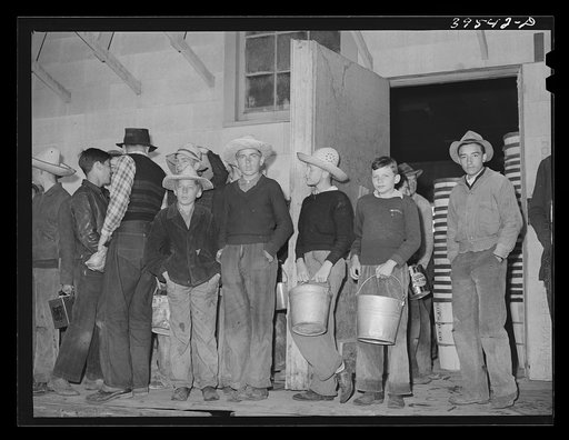 High school boys on their way to pick peas. Canyon County, Idaho