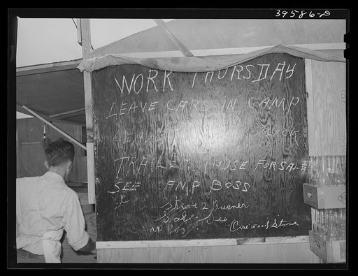 Bulletin board in labor contractor's camp (pea pickers). Canyon County, Idaho