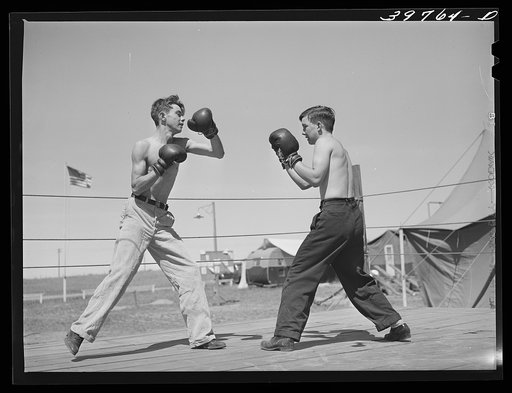 Boxing. Transient workers living at the FSA (Farm Security Administration) migratory farm labor camp. Athena, Oregon (mobile unit)