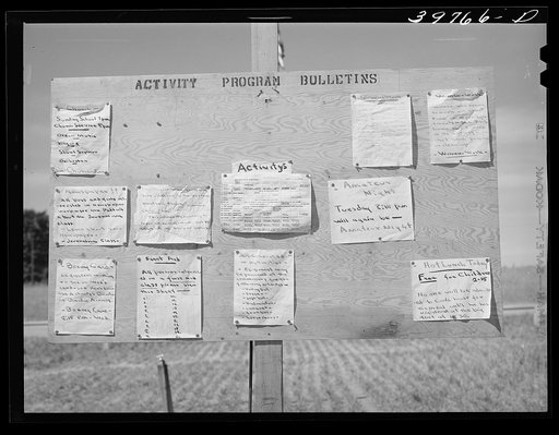 Activity program bulletin board at the FSA (Farm Security Administration) migratory farm labor camp mobile unit. Athena, Oregon