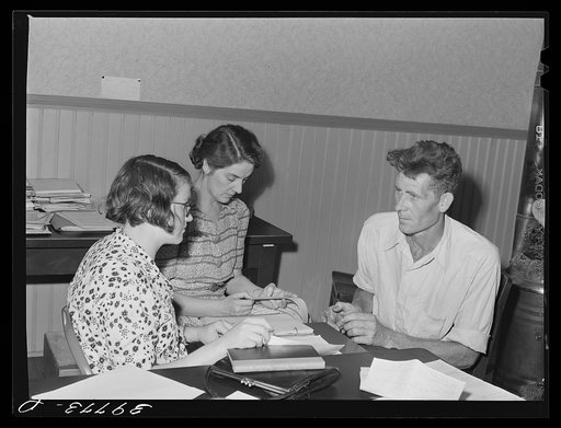 Untitled photo, possibly related to: FSA (Farm Security Administration) clients making plans for farms in county supervisor's office. Grangeville, Idaho