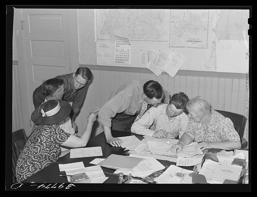 FSA (Farm Security Administration) clients making plans for farms in county supervisor's office. Grangeville, Idaho