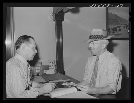 Farmer selling his wheat through the Walla Walla Grain Growers. Walla Walla, Washington