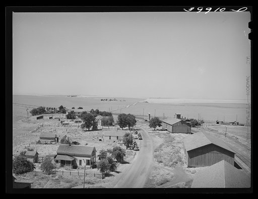 Eureka, Walla Walla, Washington. This was taken from top of elevator. Notice the sack warehouse along right of road