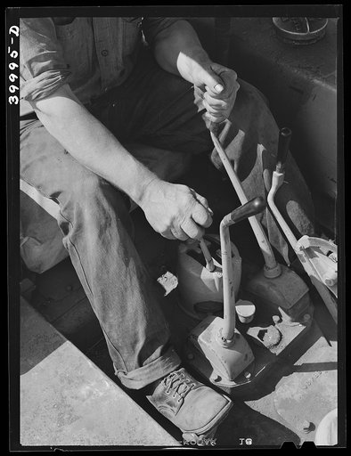 Untitled photo, possibly related to: Gear levers on caterpillar tractor. Whitman County, Washington