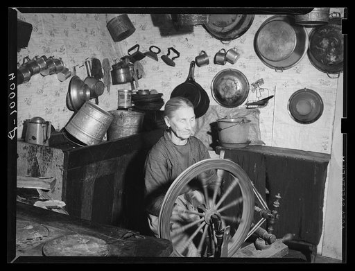 Emmy Knox spinning on a flax wheel, Garrett Co., Md
