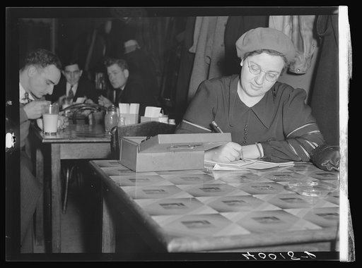 Head of U.A.W. (United Auto Workers) Women's Auxiliary kitchen set up in a restaurant opposite Fisher body plant number three. Strikers were fed here and trucks of food were sent from here to the men in factories twice daily. Flint, Michigan