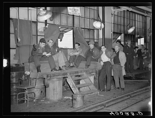 Strikers guarding window entrance to Fisher body plant number three. Flint, Michigan