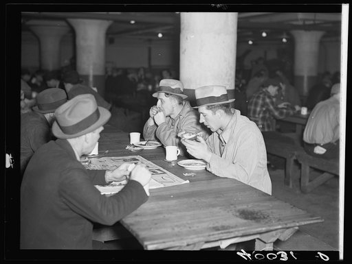 Strikers eating in cafeteria in Fisher body plant factory number three. Flint, Michigan