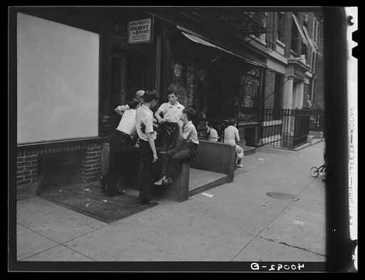 New York, New York. 1938. A group of boys on East 62nd (or 63rd) Street
