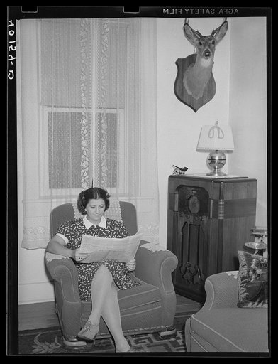 Lititz (vicinity), Lancaster County, Pennsylvania. Mrs. Paul Minnich in her living room on the farm of her father-in-law, C.F. Minnich