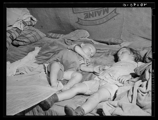Birdsboro (vicinity), Berks County, Pennsylvania. Edward and Doris Glass taking their afternoon nap in the hayloft on the farm of FSA (Farm Security Administration) client Dallas E. Glass