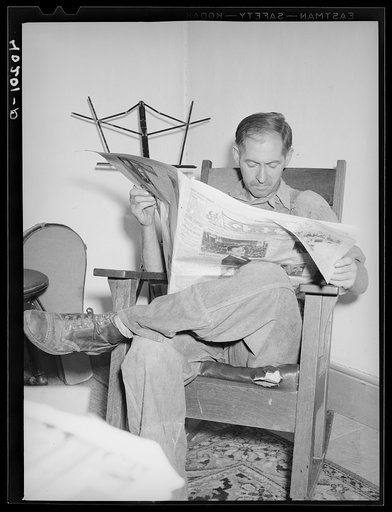 Thomas Evans, a FSA (Farm Security Administration) client, waiting for dinner. Barto, Berks County, Pennsylvania
