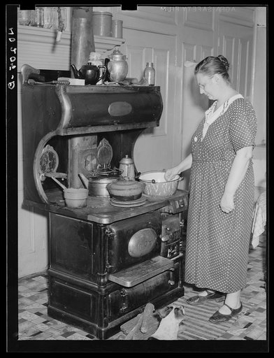 Barto, Berks county, Pennsylvania. Mrs. Thomas Evans in the kitchen on the farm of Thomas G. Evans, a FSA (Farm Security Administration) client