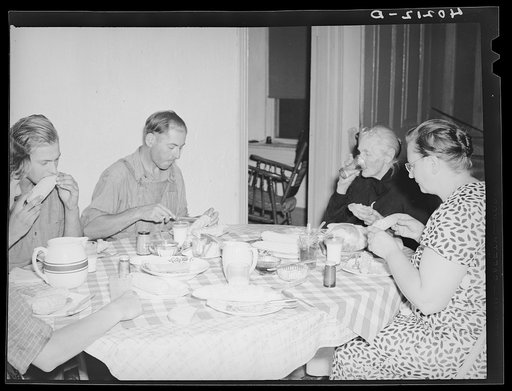Barto, Berks County, Pennsylvania. The Evans family at supper on the farm of Thomas G. Evans, a FSA (Farm Security Administration) client