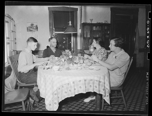 Lancaster County, Pennsylvania. The Royer family at supper in the house on the Enos Royer farm