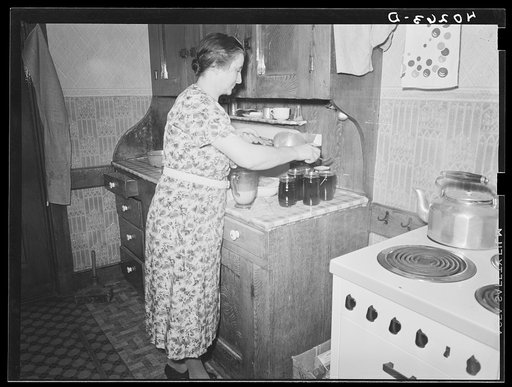 Lancaster County, Pennsylvania. Mrs. Royer putting up jellies on the Enos Royer farm